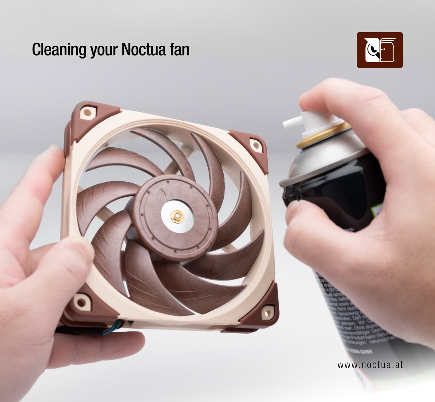 Canned air is pointed towards a fan