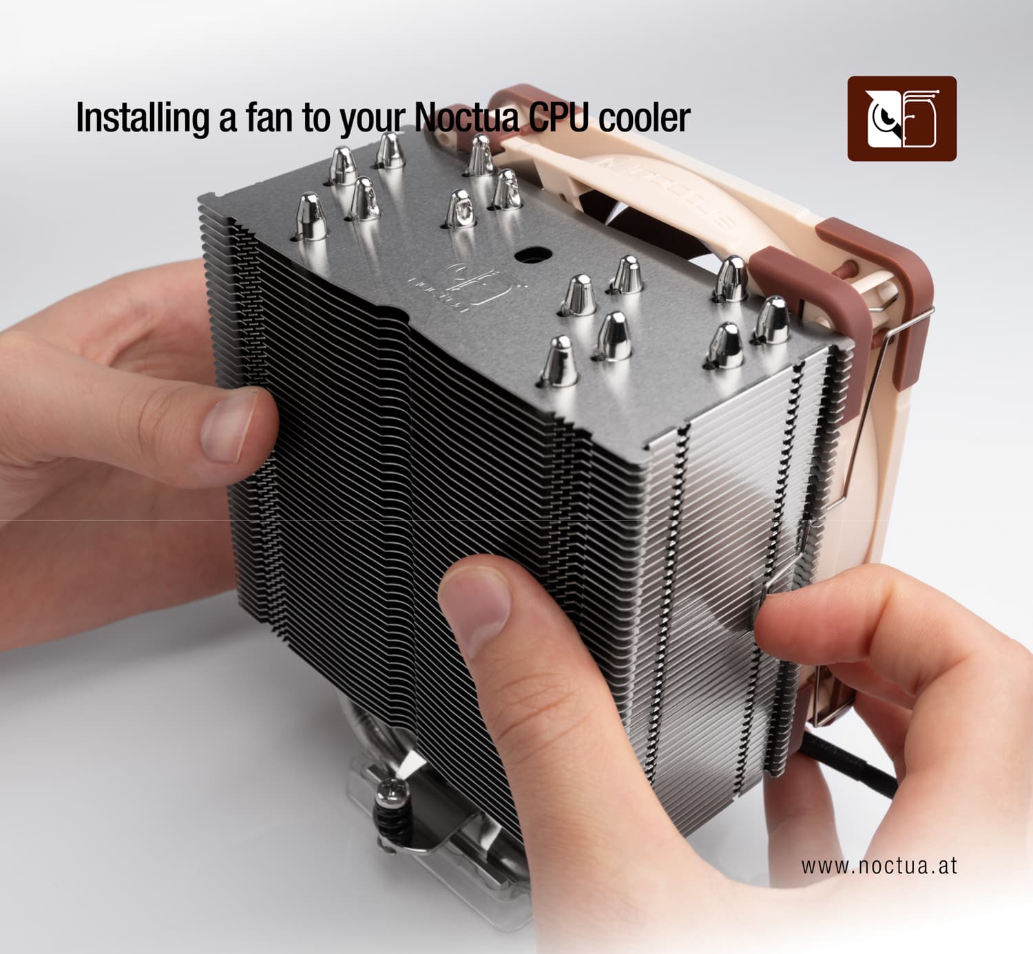 A fan is installed on a cooler by holding the fan to the heatsink and pulling the fan clips towards the heatsink.