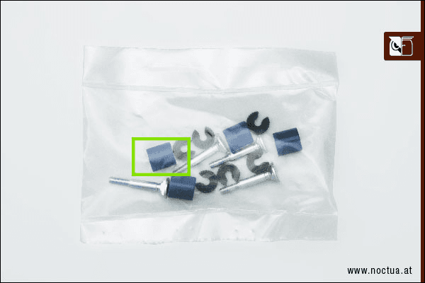 LGA17xx mounting parts included with a cooler, blue spacers marked with a green rectangle