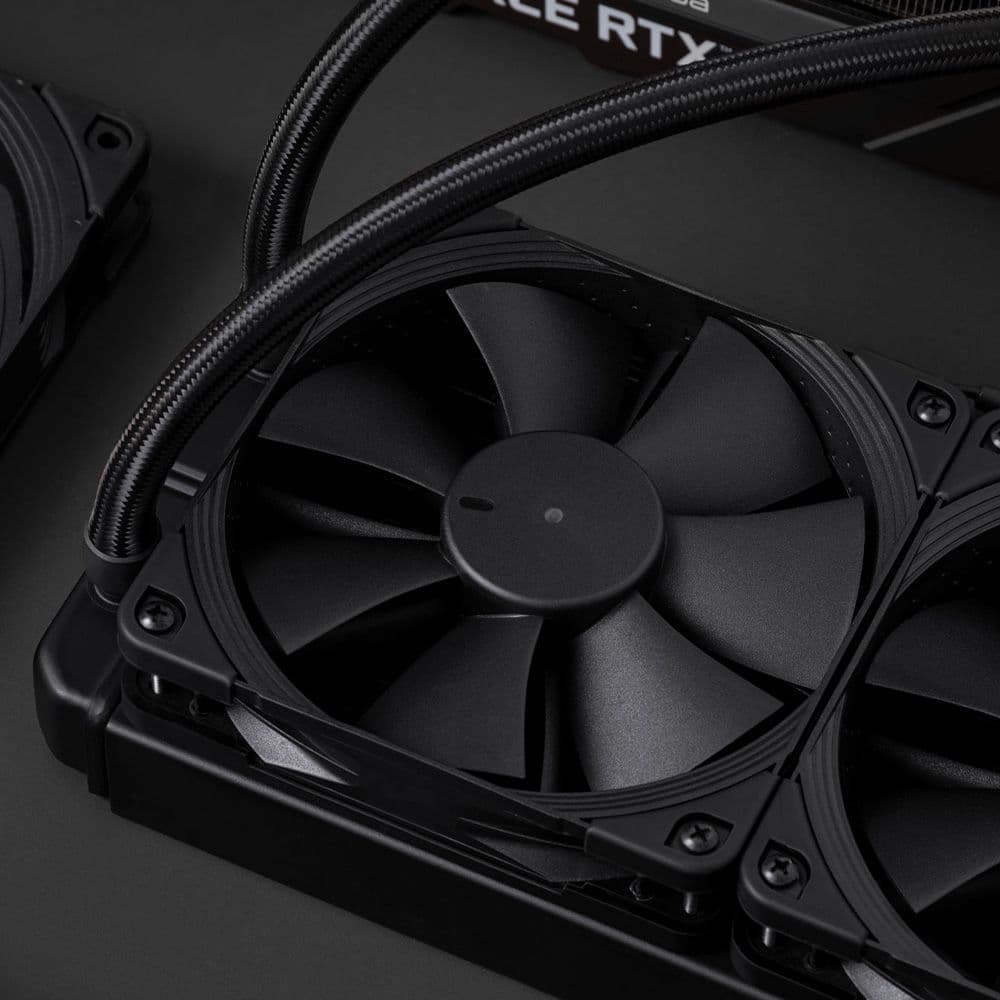 Two matte black Noctua NF-F12 chromax.black.swap fans installed on a liquid cooling radiator, with a braided tube visible in the background.