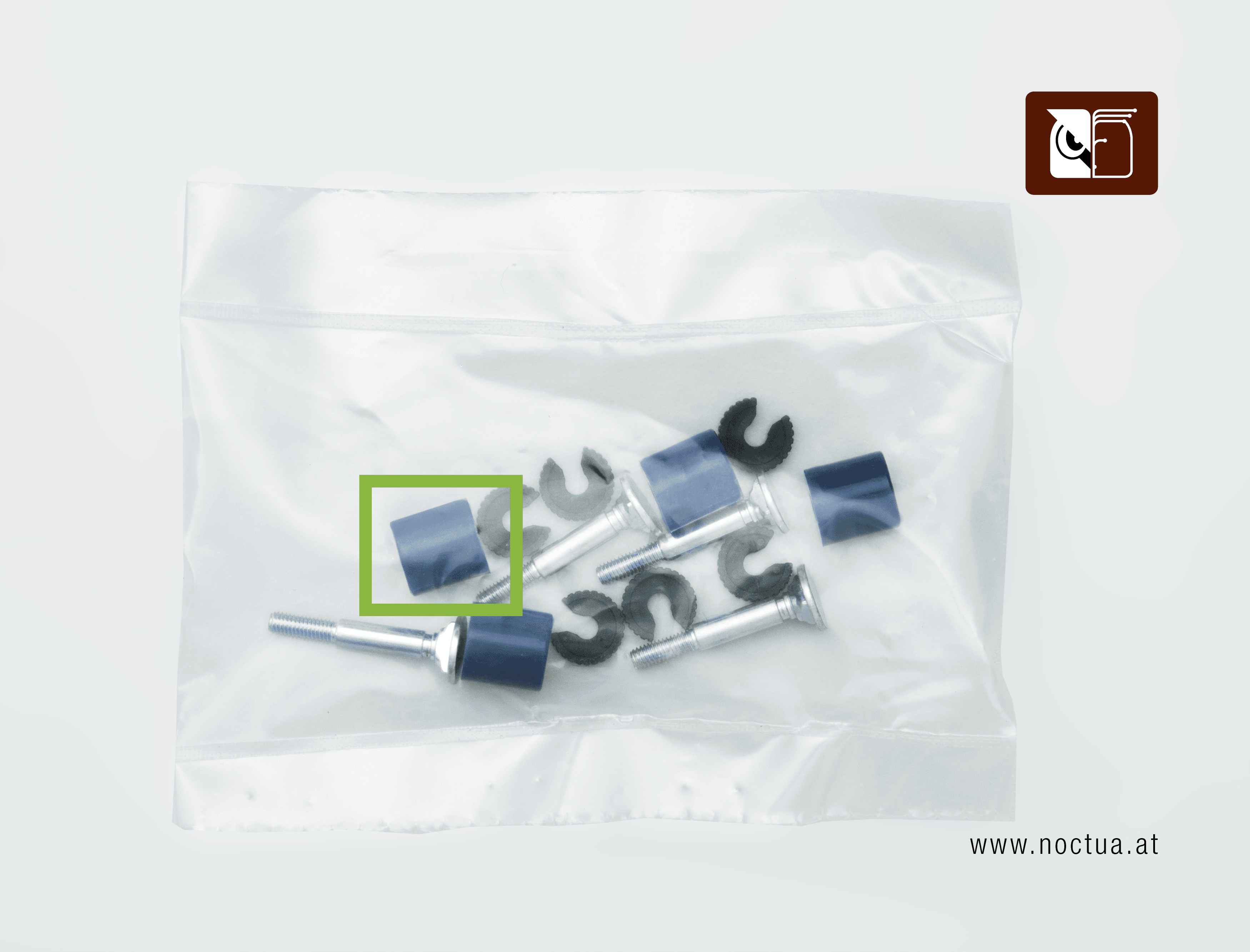 LGA17xx mounting parts included with a cooler, blue spacers marked with a green rectangle