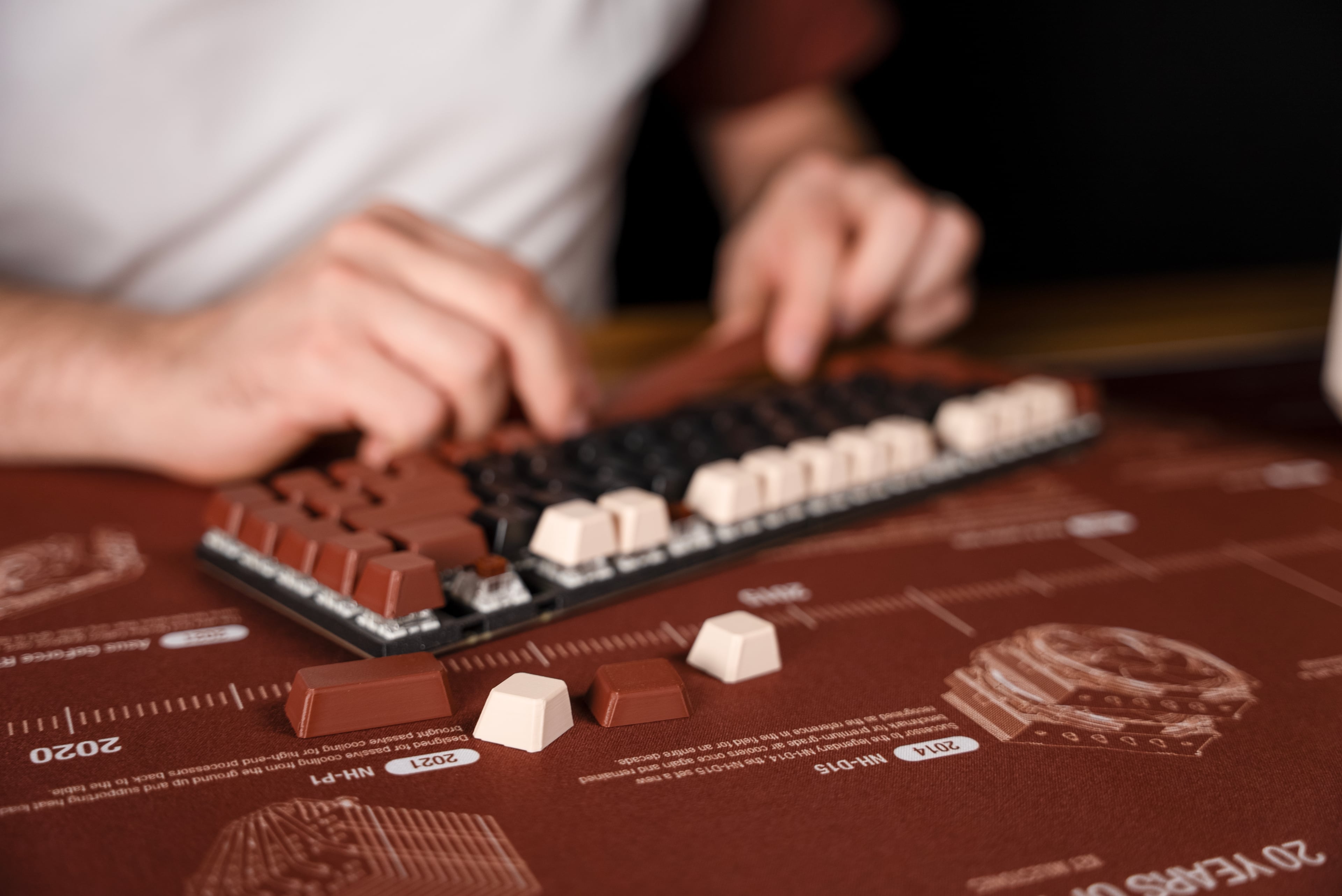 3D printed key caps in Noctua beige and brown